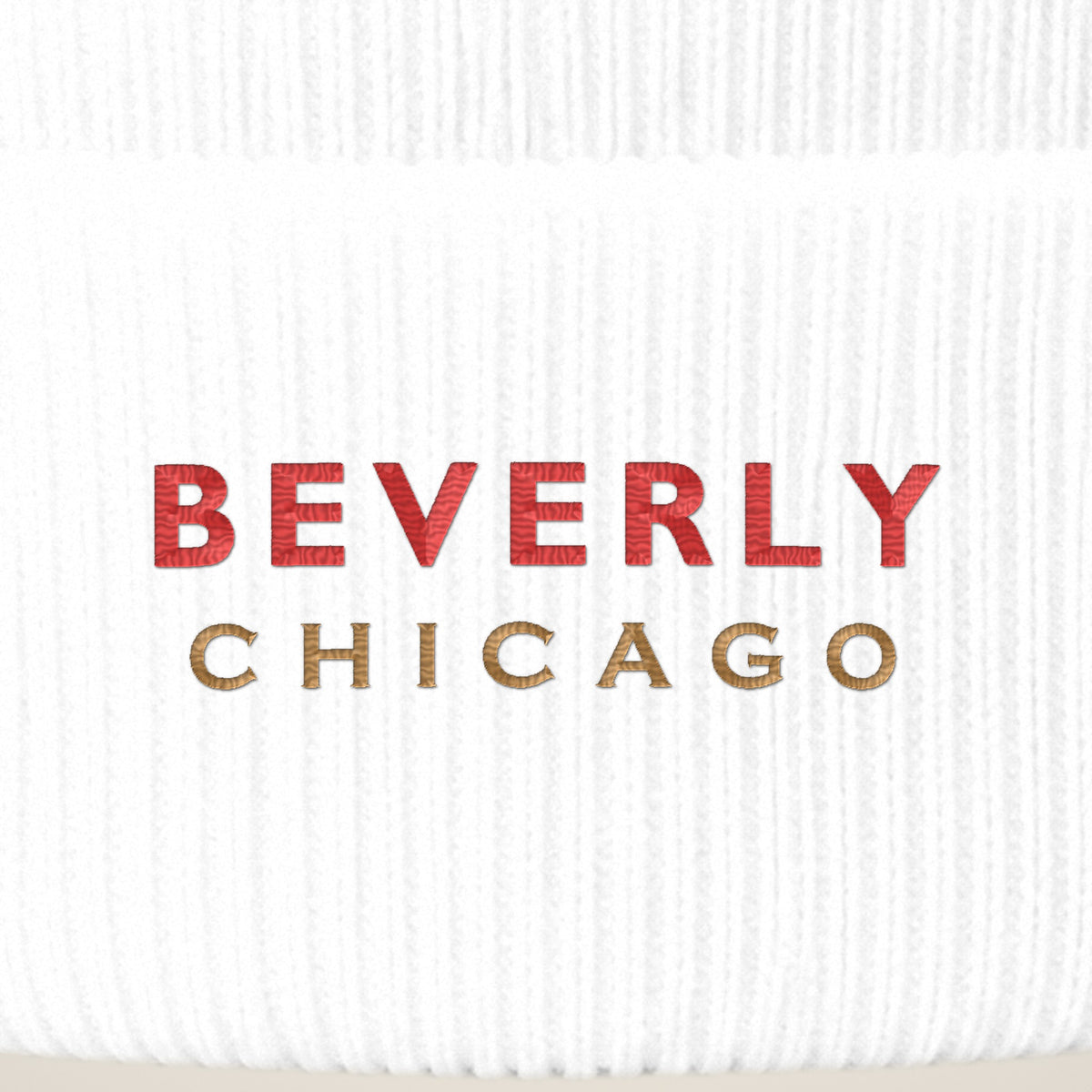 Beverly Chicago embroidery close-up in red and old gold thread
