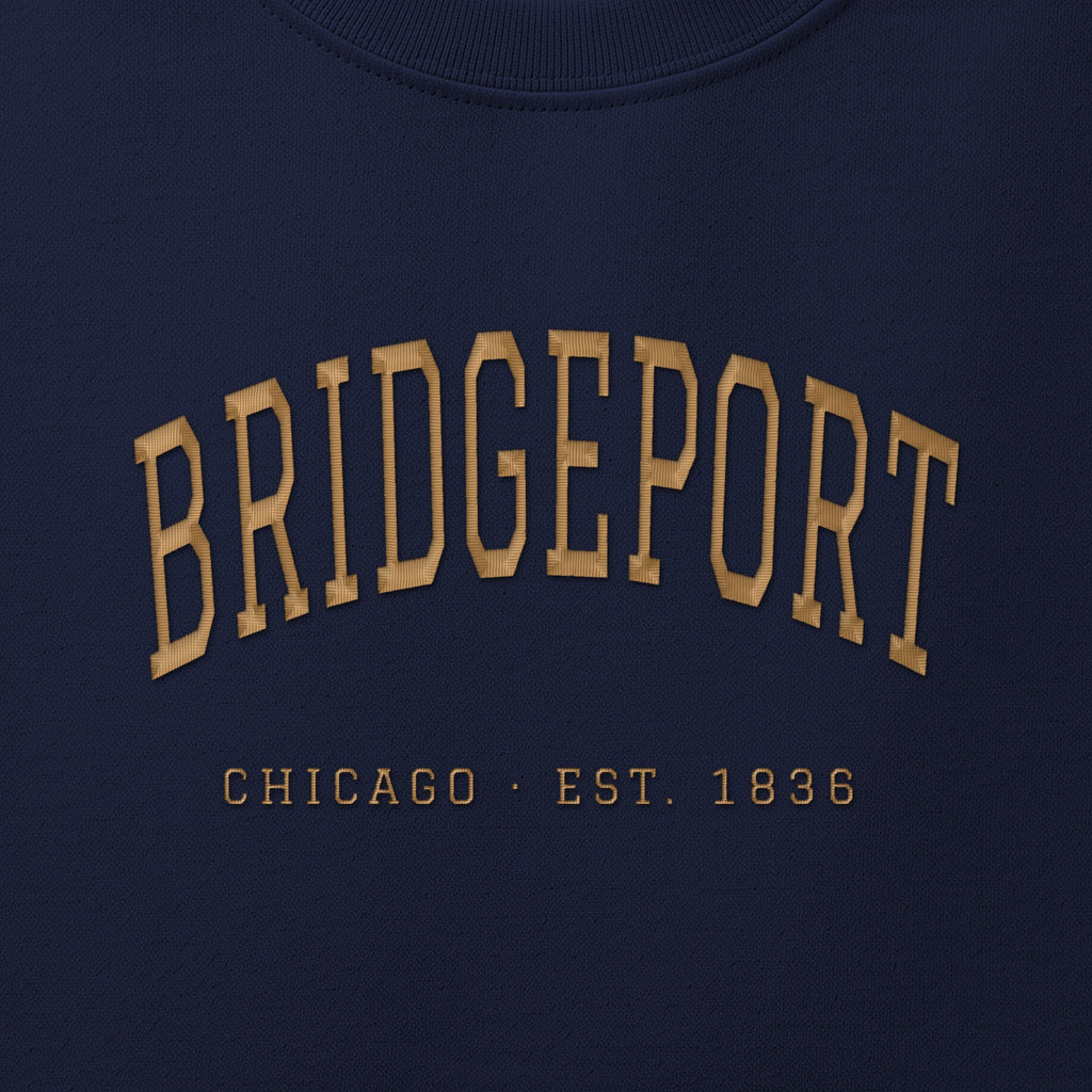 Close-up of gold satin-stitch Bridgeport embroidery