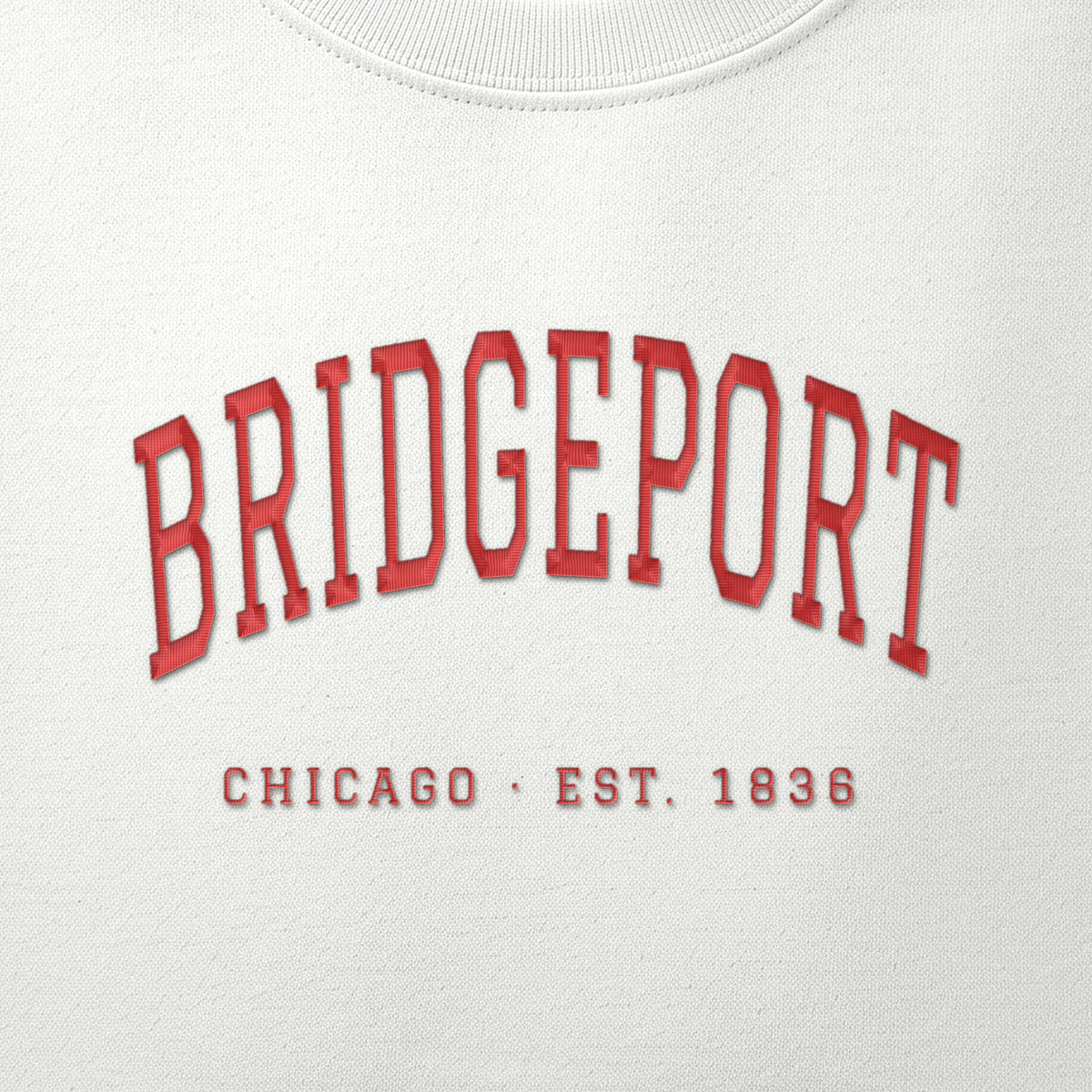 Close-up of red satin-stitch Bridgeport embroidery