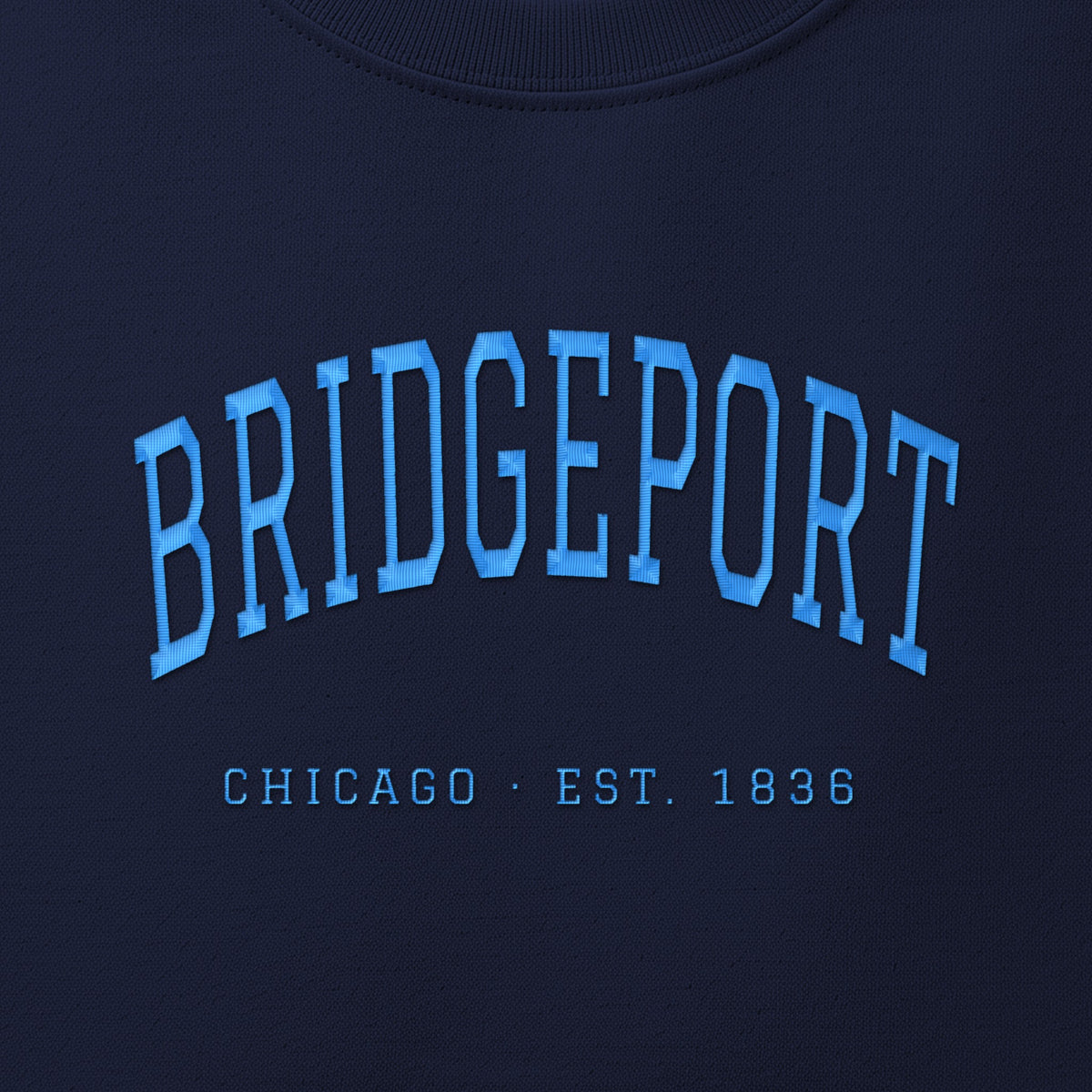 Close-up of sky blue satin-stitch Bridgeport embroidery