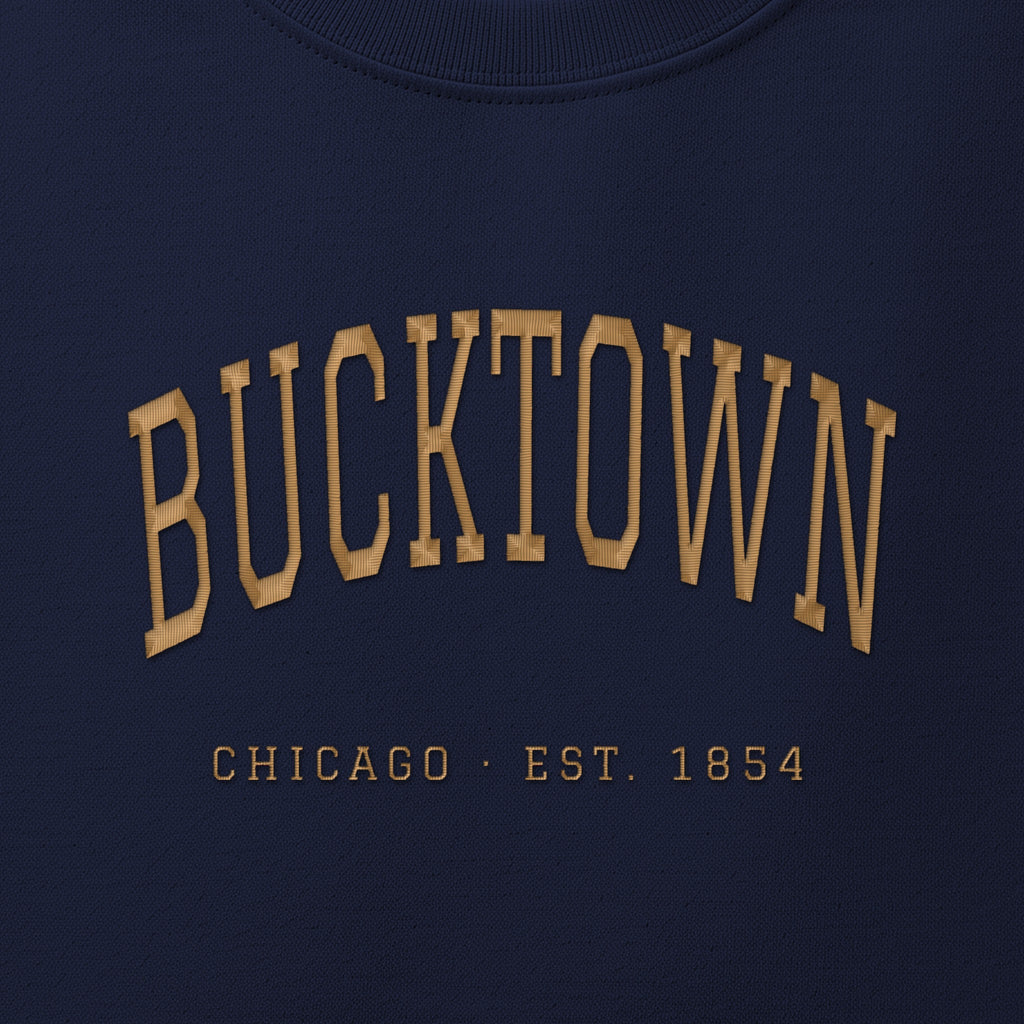 Close-up of gold satin-stitch Bucktown embroidery