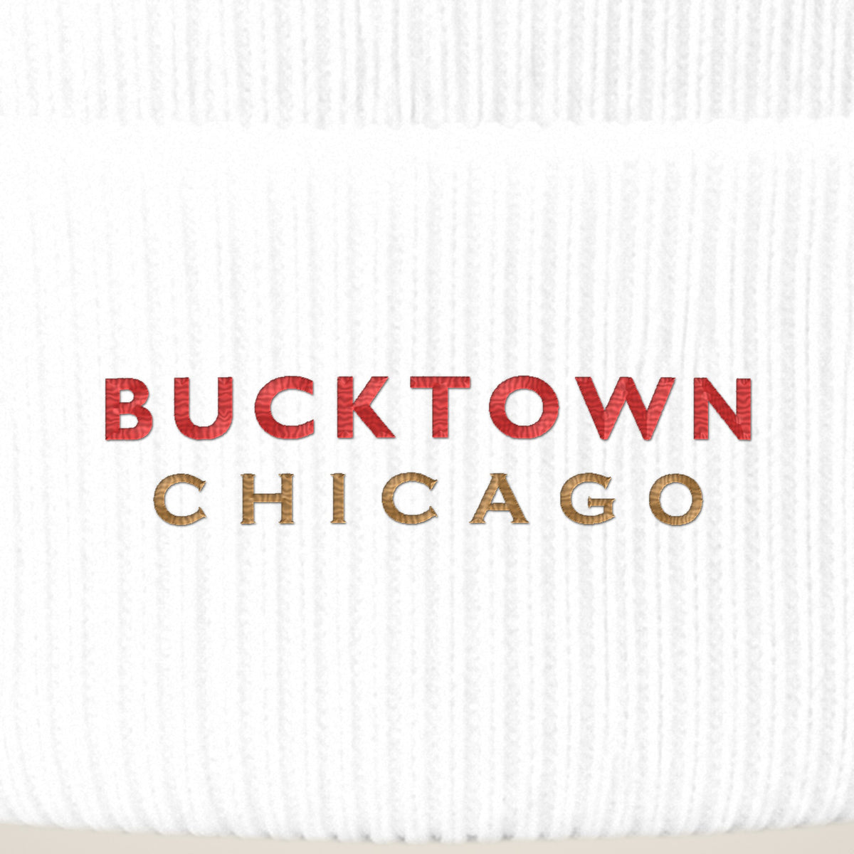 Bucktown Chicago embroidery close-up in red and old gold thread