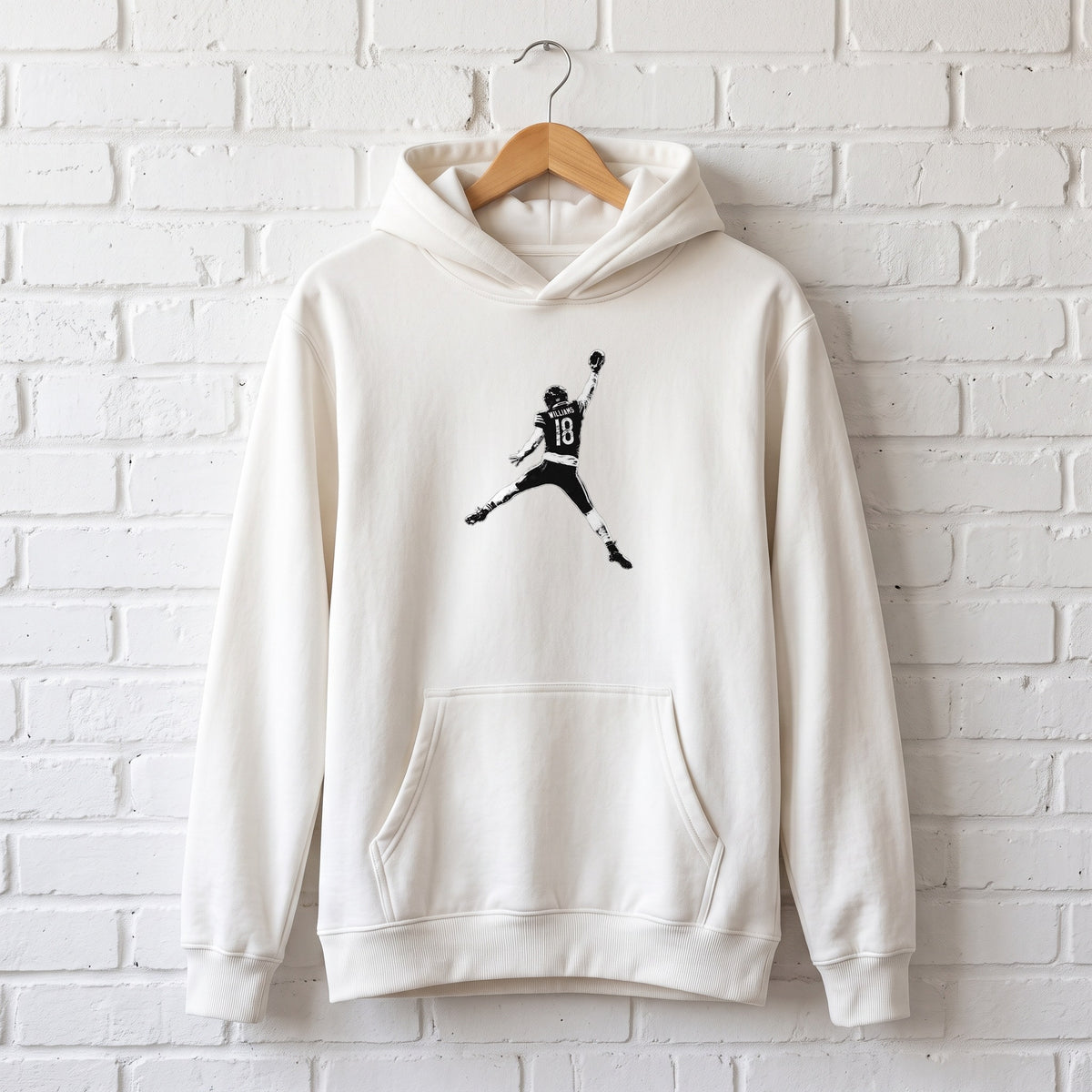 Caleb Williams Jump Man Hoodie — white hoodie on a wooden hanger