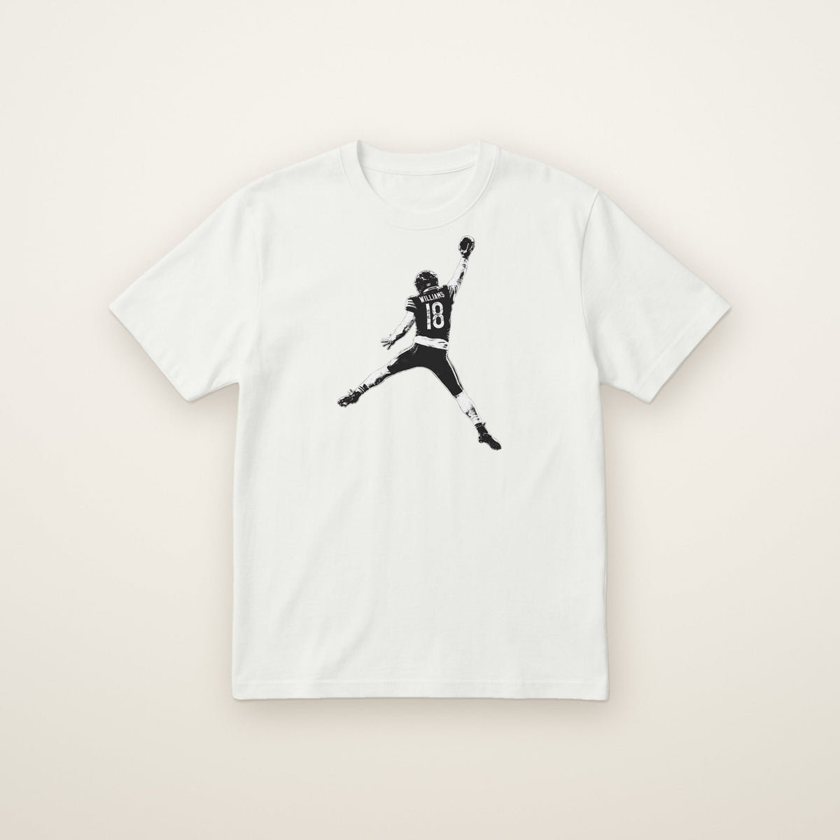 Caleb Williams Jump Man Tee in White, flat lay on ivory