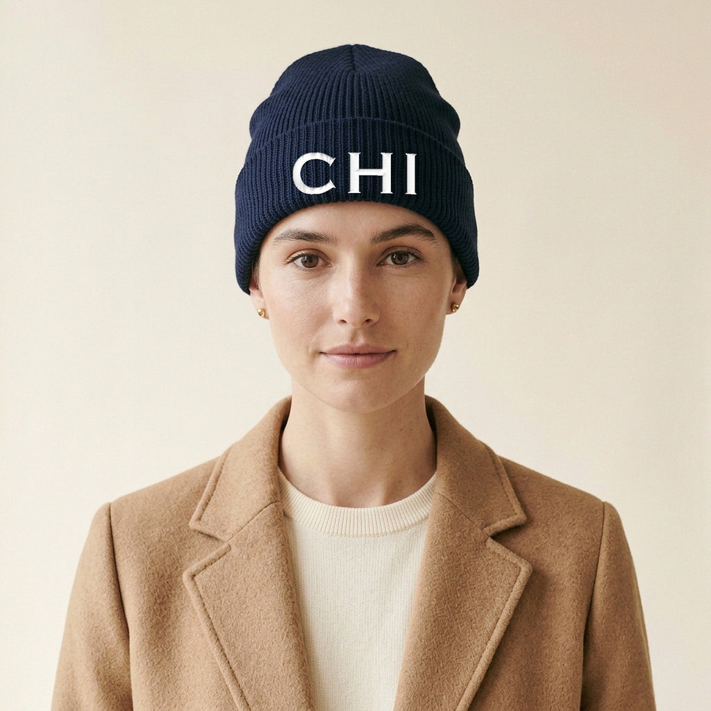Model wearing the CHI Embroidered Cuffed Beanie in Navy