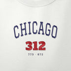 Close-up of navy and red satin-stitch Chicago 312 embroidery