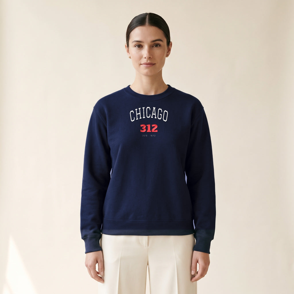 Model wearing the Chicago 312 embroidered crewneck in Navy, white and red thread