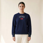 Model wearing the Chicago 312 embroidered crewneck in Navy, white and red thread