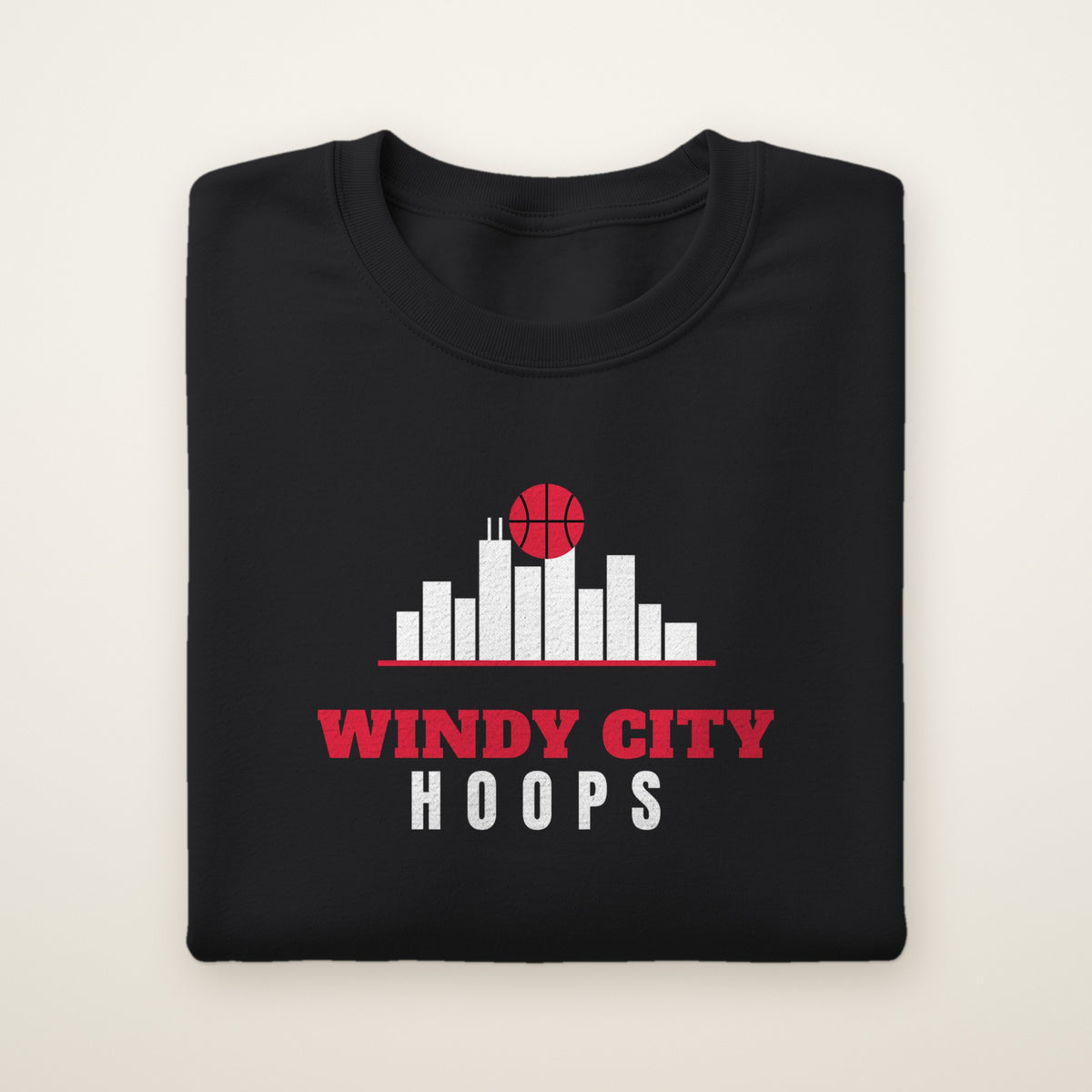 Windy City Hoops crewneck, Black, folded on ivory