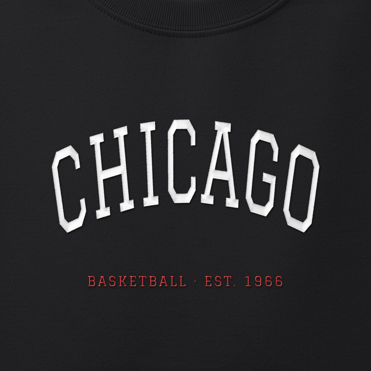 Close-up of the white & red satin-stitch Chicago Arch embroidery