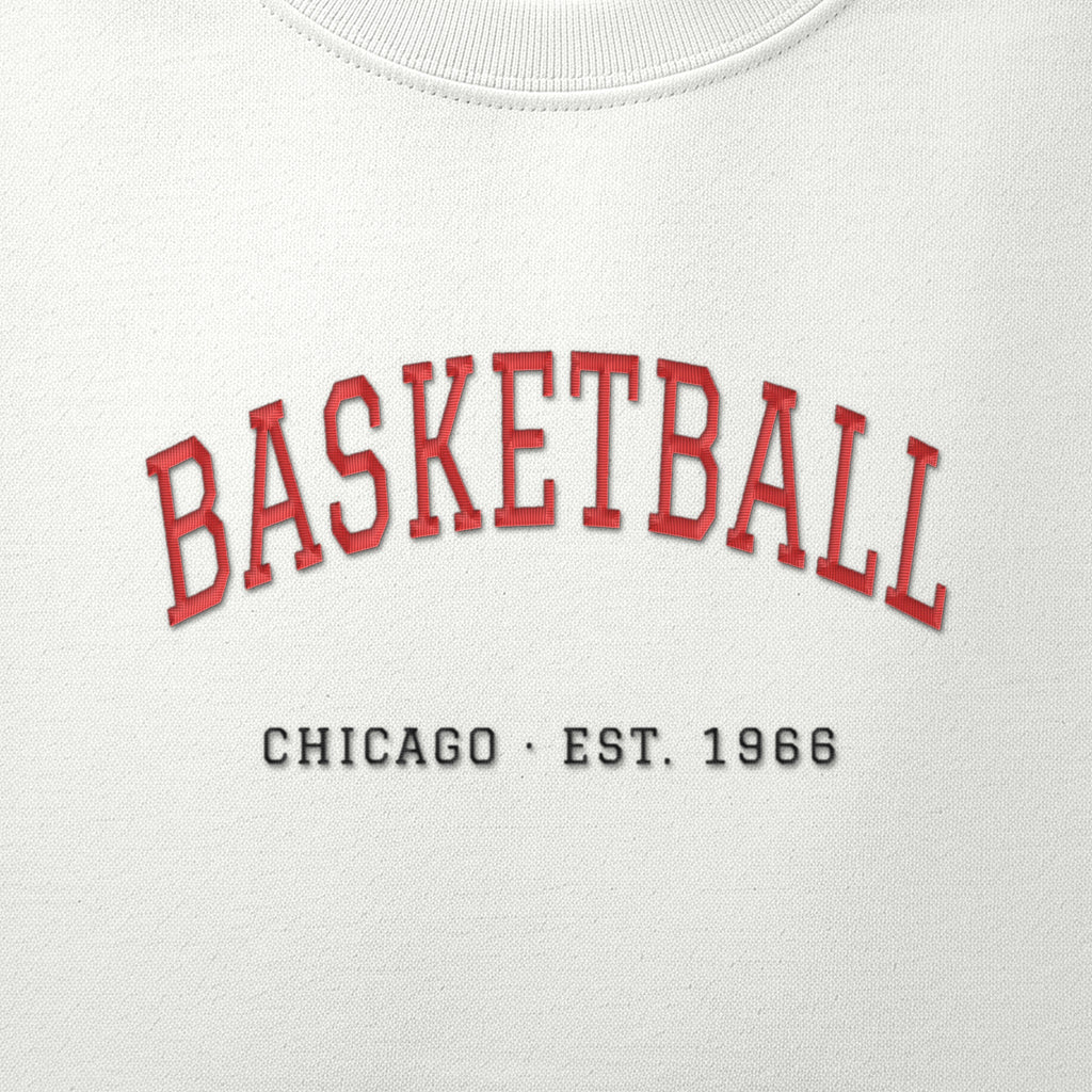 Close-up of the red & black satin-stitch Est. 1966 embroidery