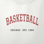 Close-up of the red & black satin-stitch Est. 1966 embroidery