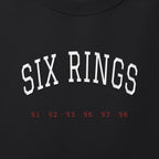 Close-up of the white & red satin-stitch Six Rings embroidery