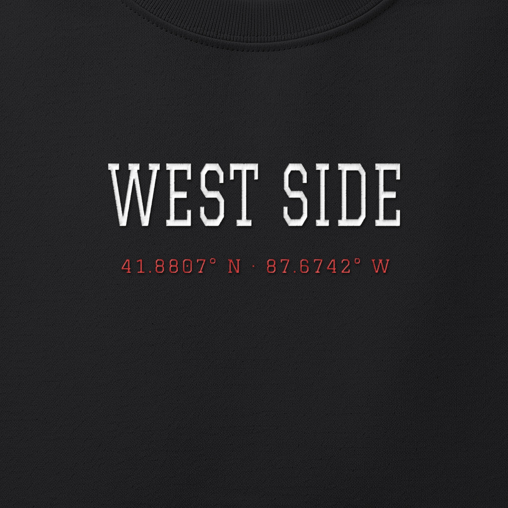 Close-up of the white & red satin-stitch West Side Coordinates embroidery