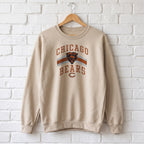 Chicago Bears Retro Crewneck Sweatshirt — sand crewneck on a wooden hanger