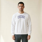 Model wearing the Chicago Embroidered Crewneck — Navy Thread in White