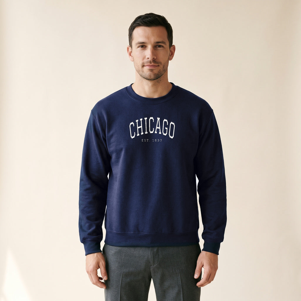 Model wearing the Chicago Embroidered Crewneck — White Thread in Navy