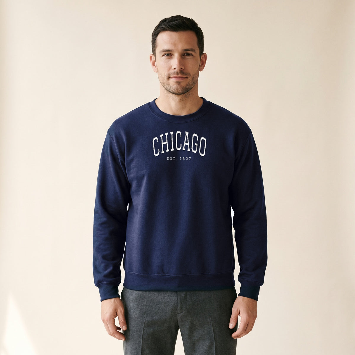 Model wearing the Chicago Embroidered Crewneck — White Thread in Navy