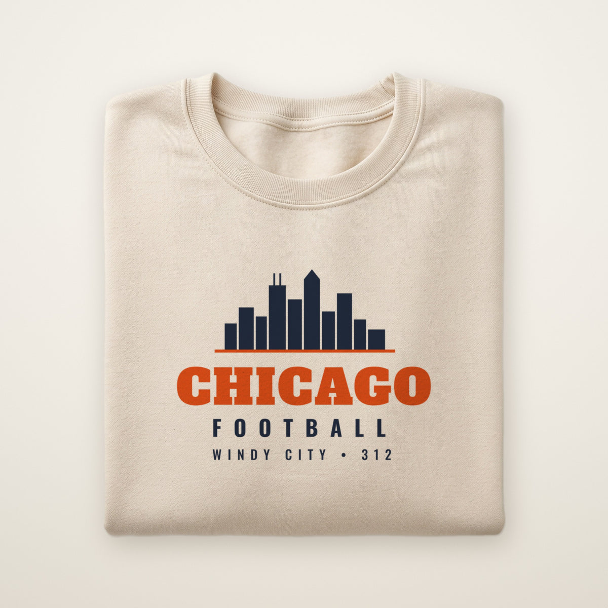 Chicago skyline football crewneck, Windy City 312, Sand, folded on ivory