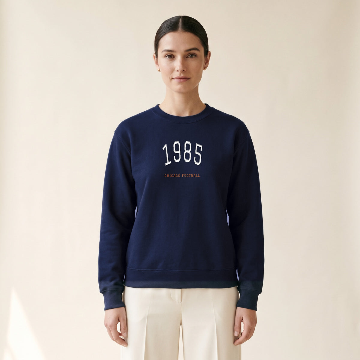 Model wearing the Chicago Football 1985 embroidered crewneck