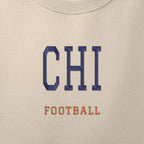 Close-up of the navy & orange satin-stitch CHI embroidery