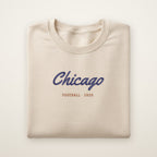 Chicago Football Embroidered Crewneck — Chicago Script in Sand, flat lay