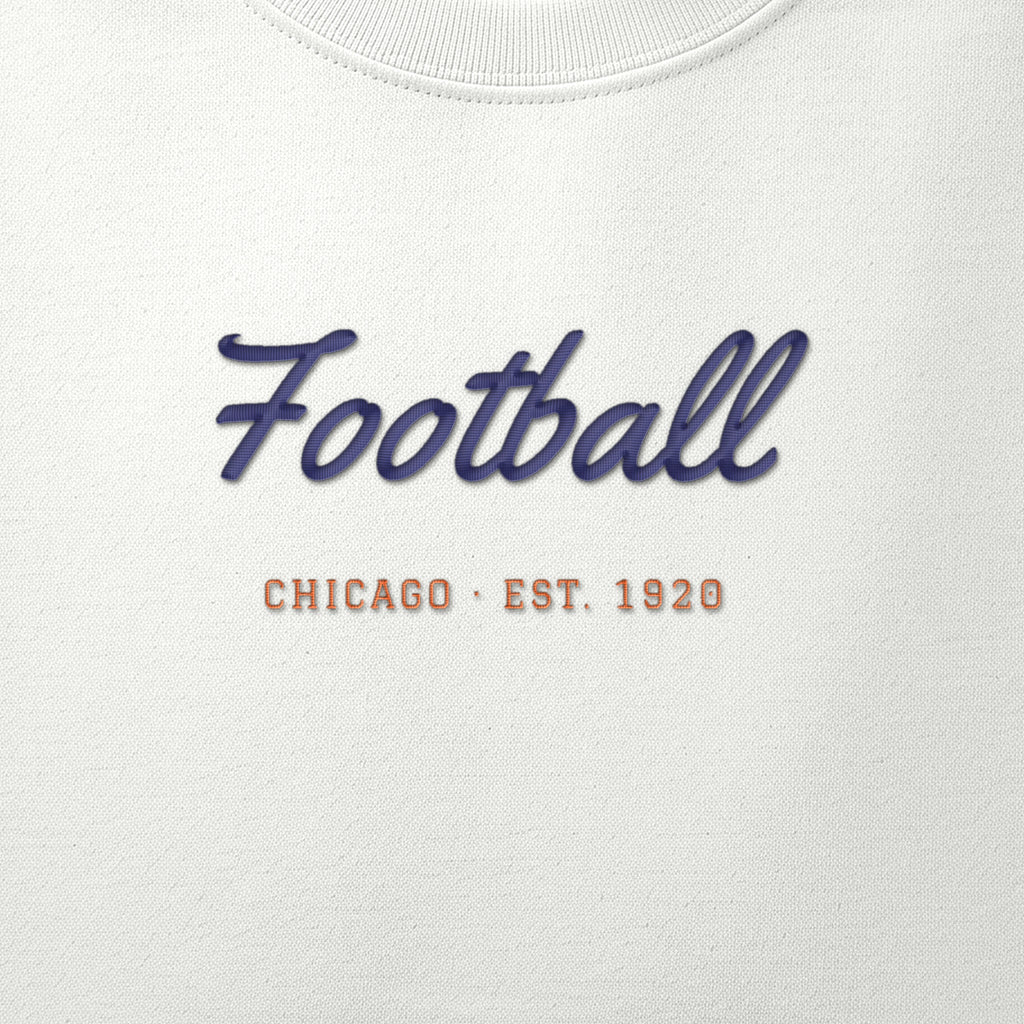 Close-up of the navy & orange satin-stitch Football Script embroidery