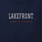 Close-up of the white & orange satin-stitch Lakefront Coordinates embroidery