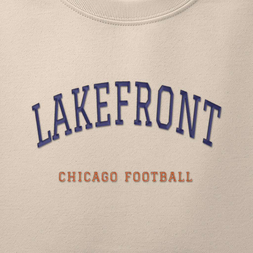 Close-up of the navy & orange satin-stitch Lakefront embroidery