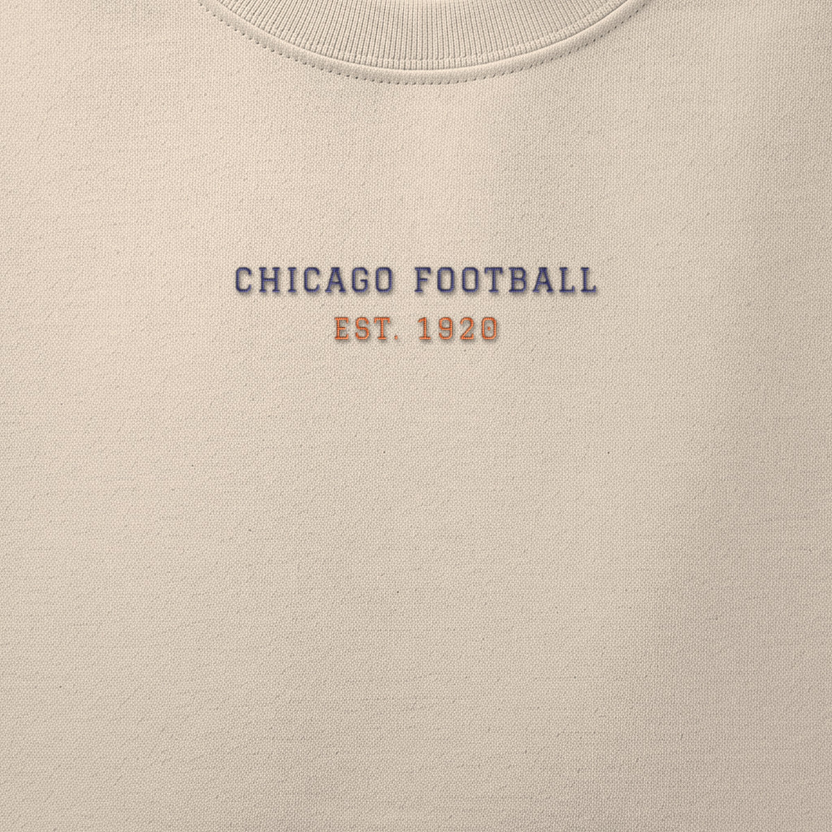 Close-up of the navy & orange satin-stitch Minimal embroidery