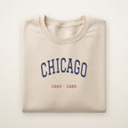 Chicago Football Embroidered Crewneck — Title Years in Sand, flat lay