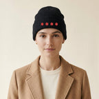 Model wearing the Chicago Four Stars Embroidered Cuffed Beanie in Black