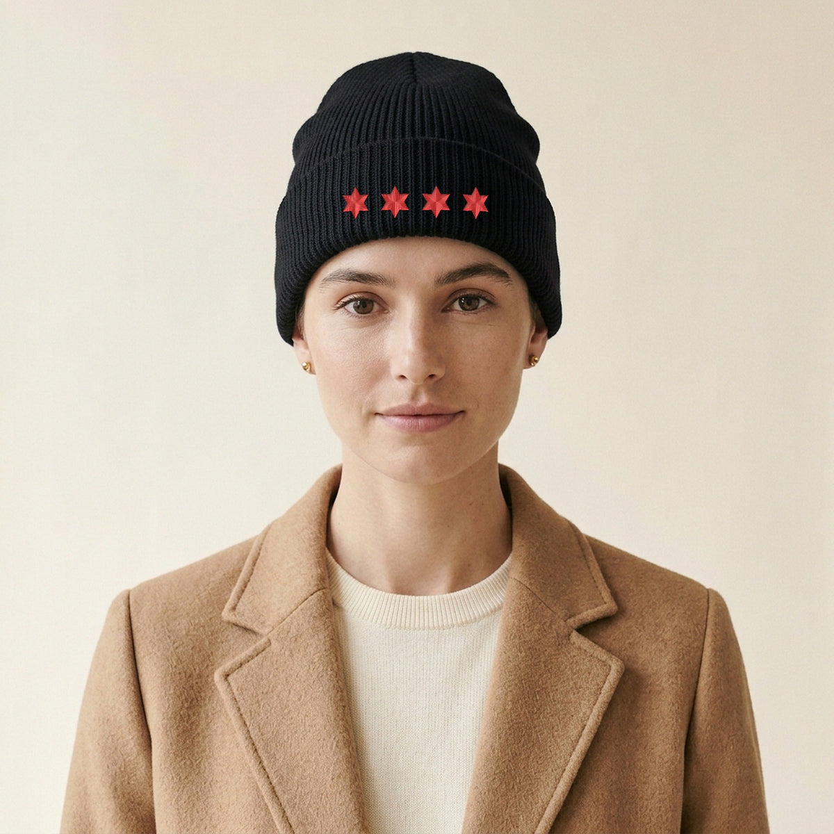 Model wearing the Chicago Four Stars Embroidered Cuffed Beanie in Black