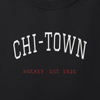 Close-up of the white & red satin-stitch Chi-Town embroidery