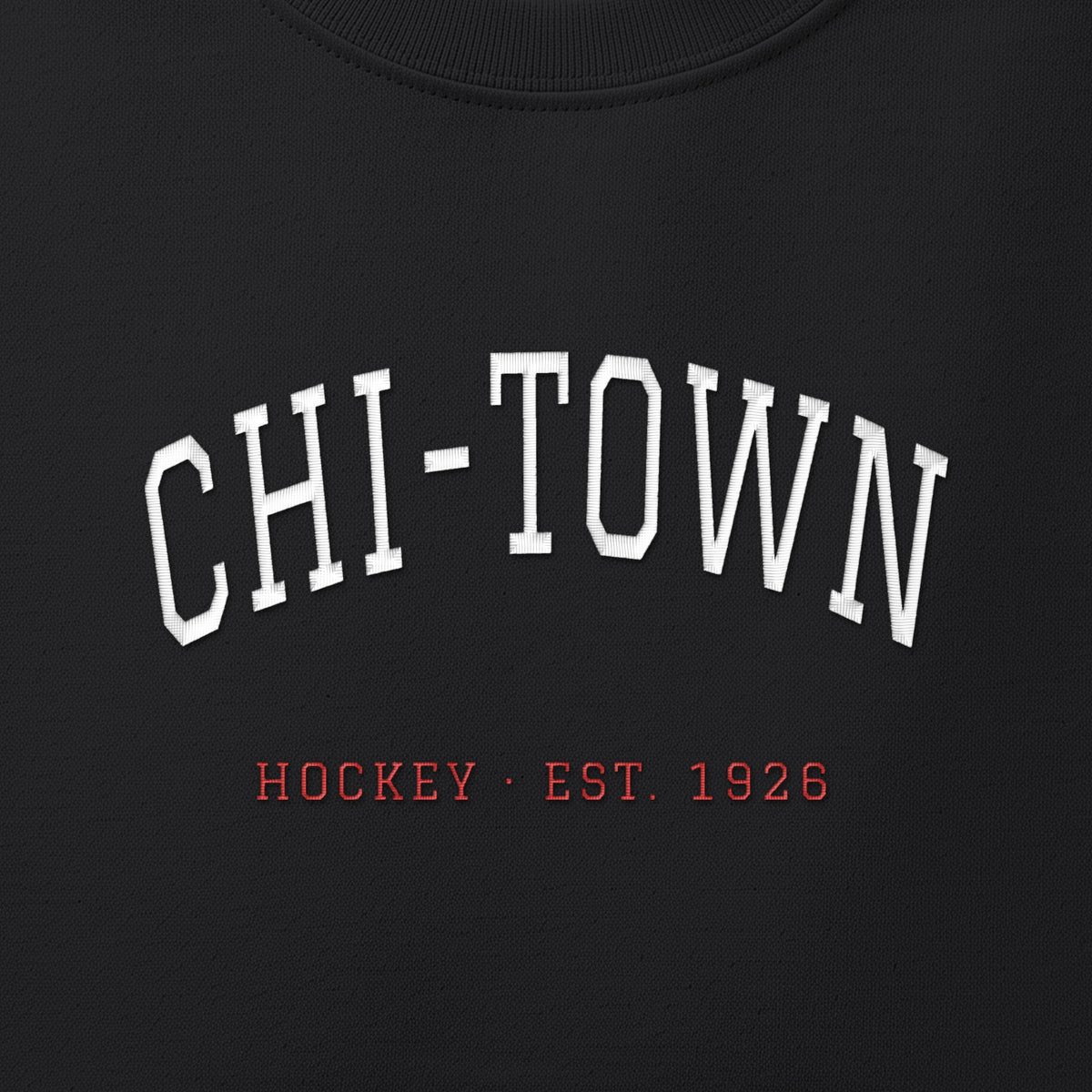 Close-up of the white & red satin-stitch Chi-Town embroidery