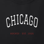 Close-up of the white & red satin-stitch Chicago Arch embroidery
