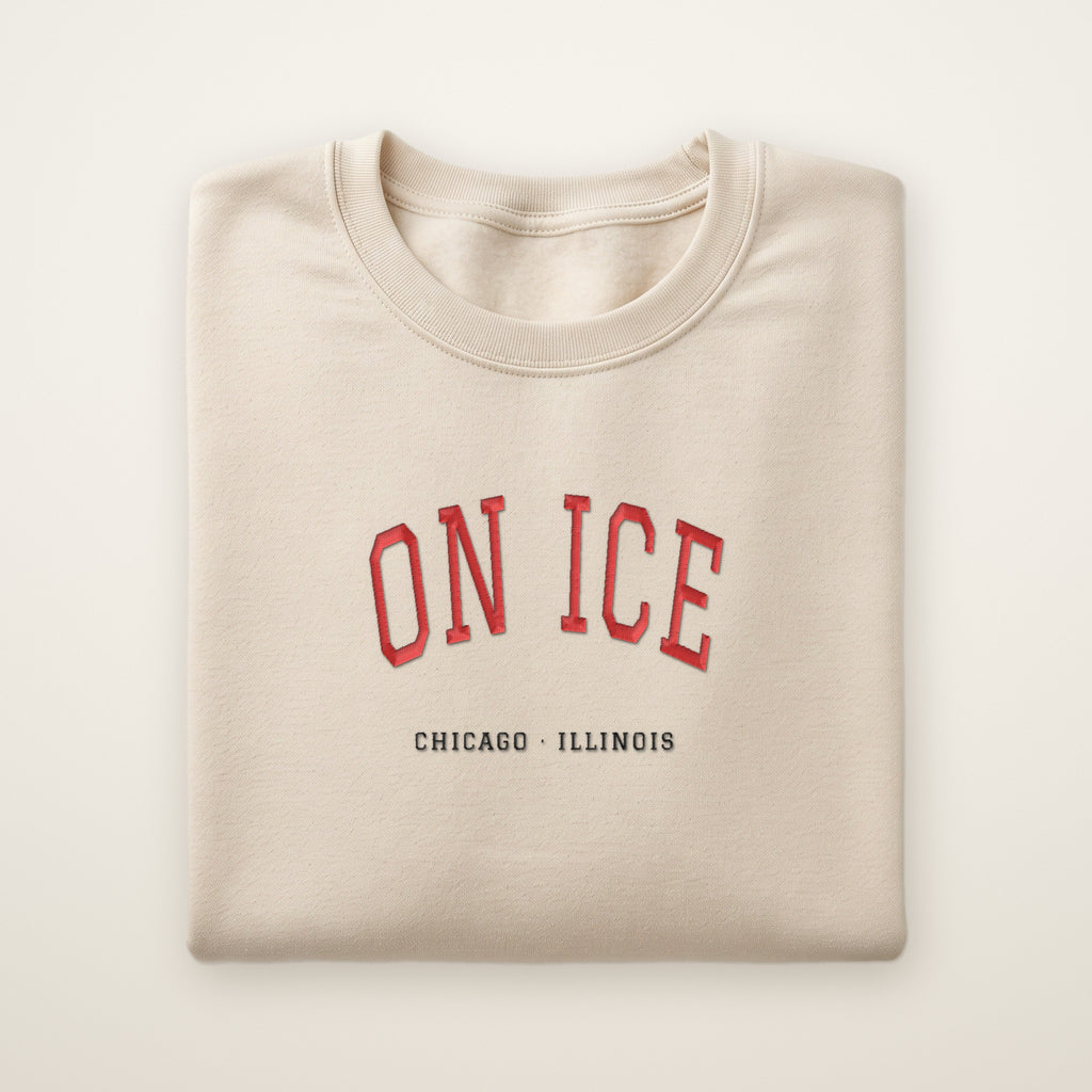 Chicago Hockey Embroidered Crewneck — On Ice in Sand, flat lay