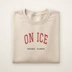 Chicago Hockey Embroidered Crewneck — On Ice in Sand, flat lay