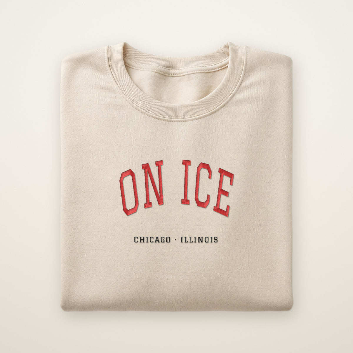 Chicago Hockey Embroidered Crewneck — On Ice in Sand, flat lay