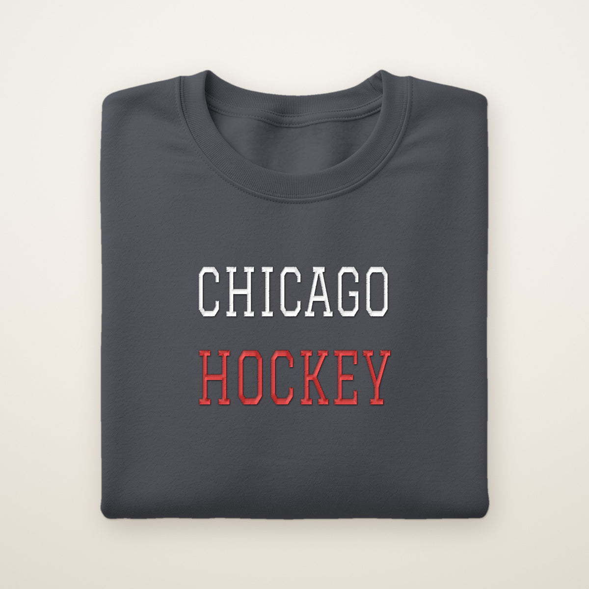 Chicago Hockey Embroidered Crewneck — Varsity in Dark Heather, flat lay