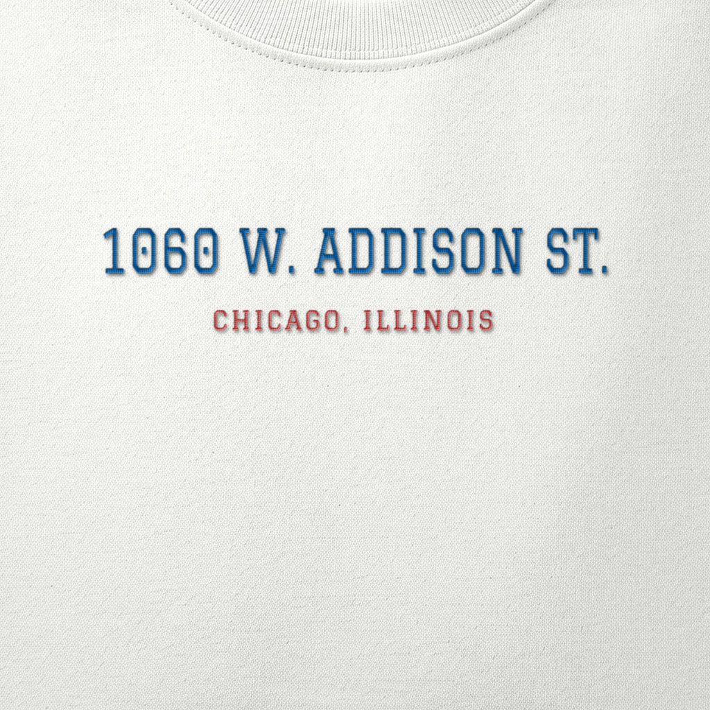 Close-up of the royal blue & red satin-stitch 1060 W. Addison St. embroidery