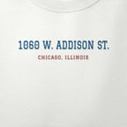 Close-up of the royal blue & red satin-stitch 1060 W. Addison St. embroidery