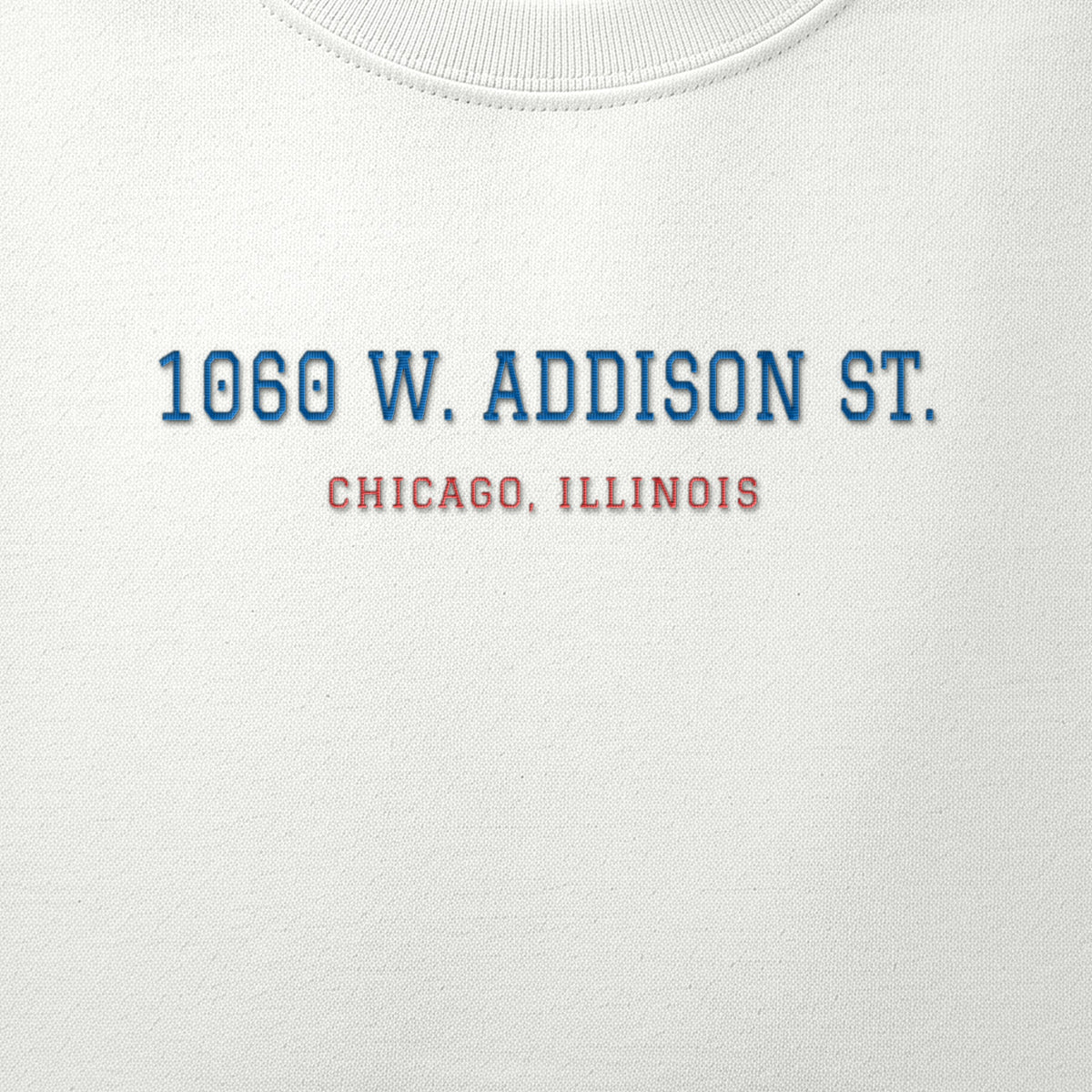 Close-up of the royal blue & red satin-stitch 1060 W. Addison St. embroidery