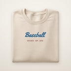 Chicago North Side Baseball Embroidered Crewneck — Baseball Script in Sand, flat lay