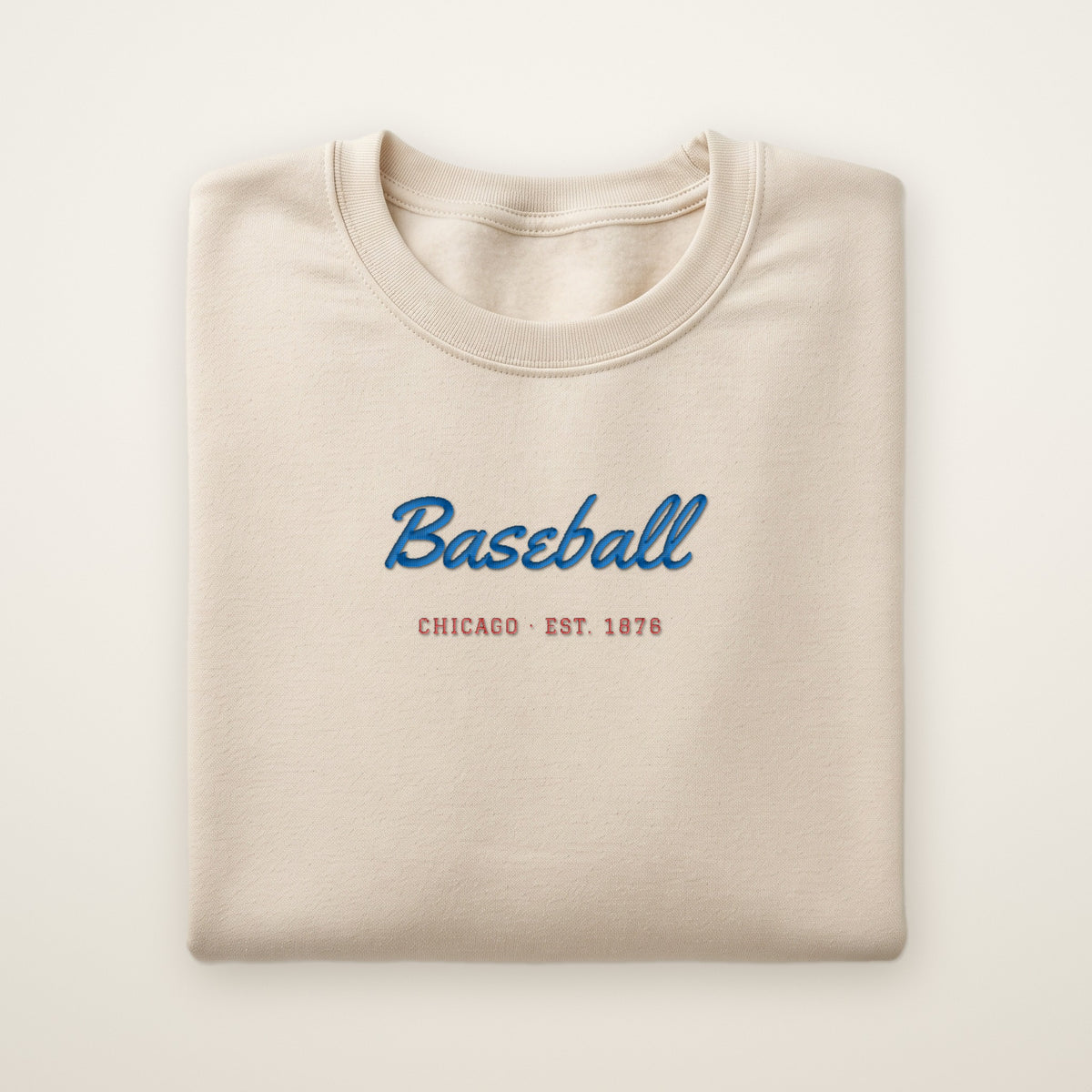 Chicago North Side Baseball Embroidered Crewneck — Baseball Script in Sand, flat lay