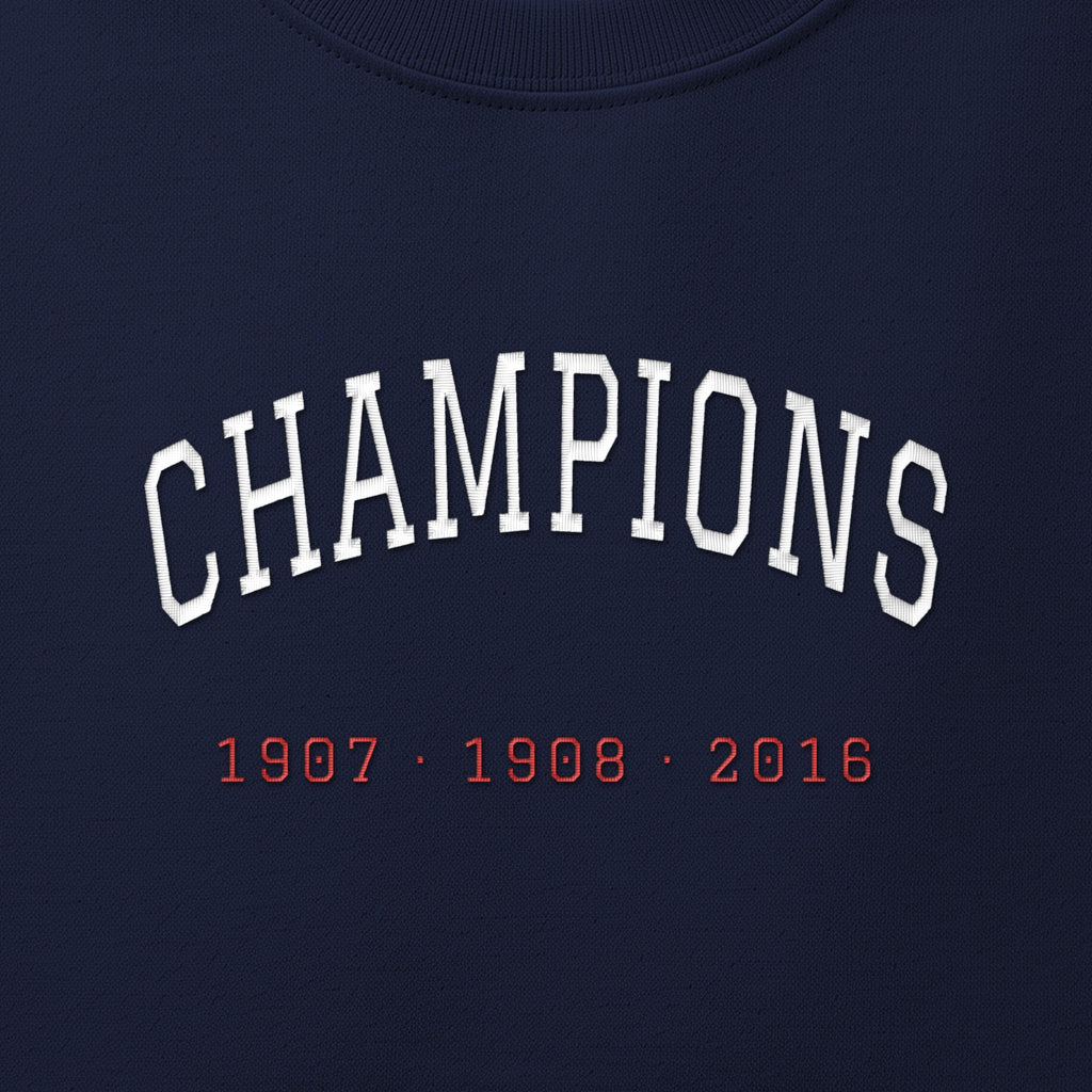 Close-up of the white & red satin-stitch Champions embroidery