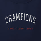 Close-up of the white & red satin-stitch Champions embroidery