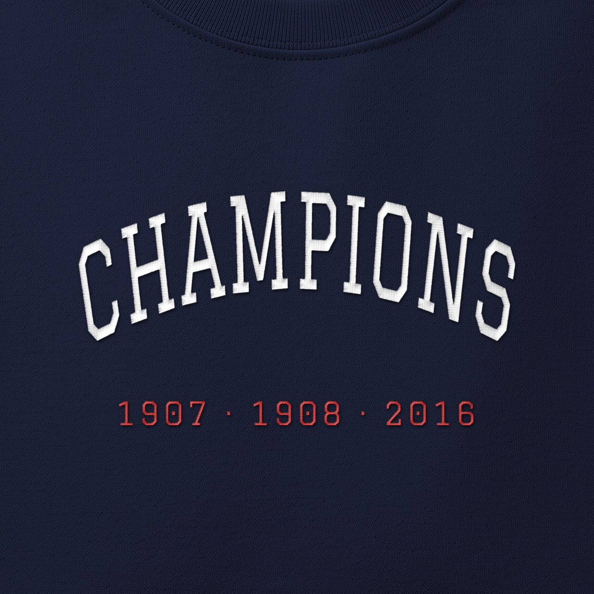Close-up of the white & red satin-stitch Champions embroidery