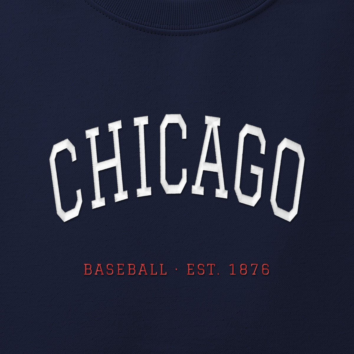 Close-up of the white & red satin-stitch Chicago Arch embroidery