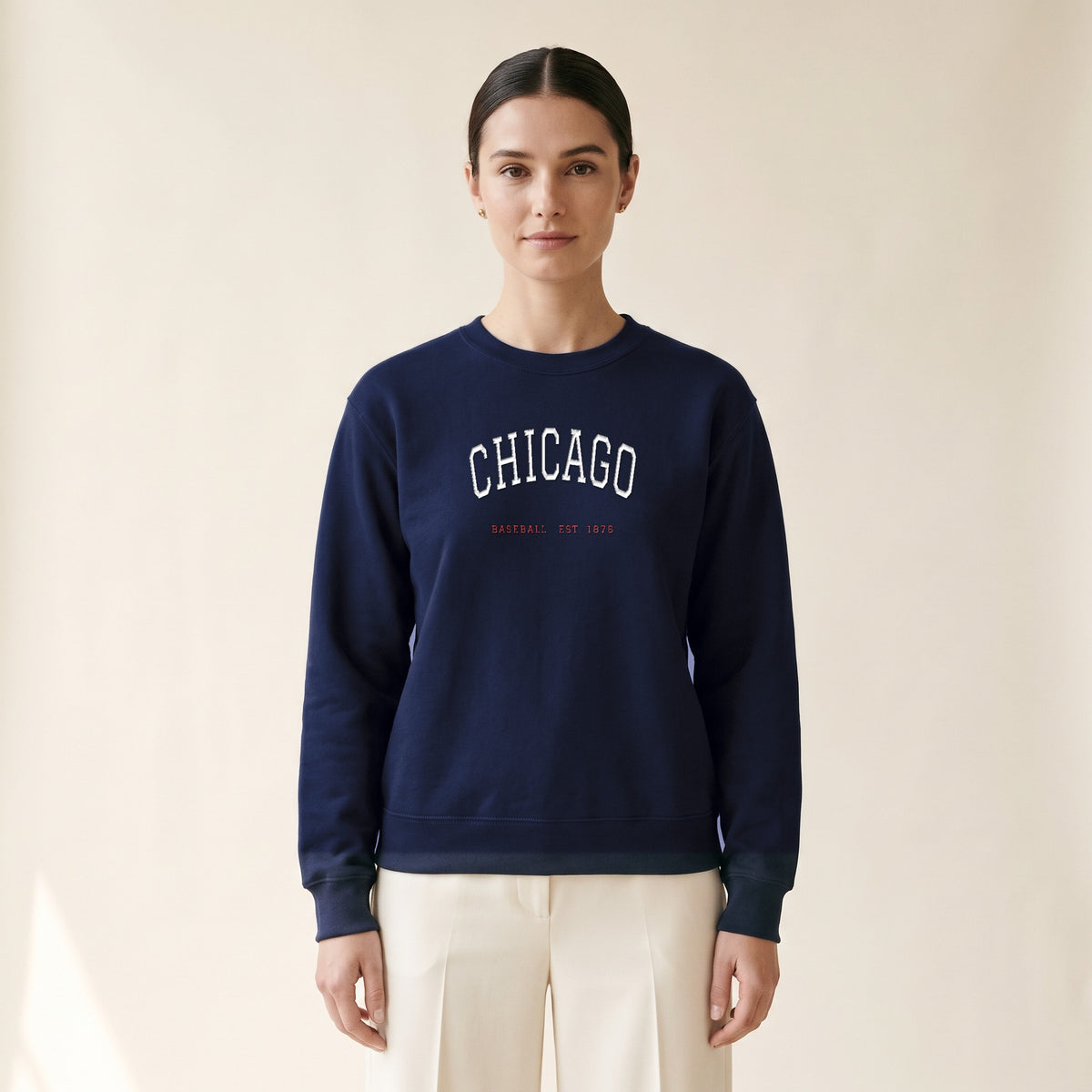 Model wearing the Chicago North Side Baseball Chicago Arch embroidered crewneck